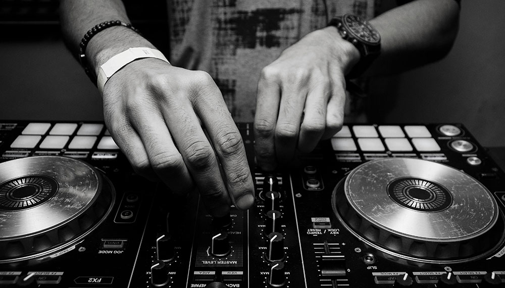 Black and white close-up of DJ station